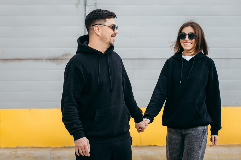 Couple in a black hoodie outfit