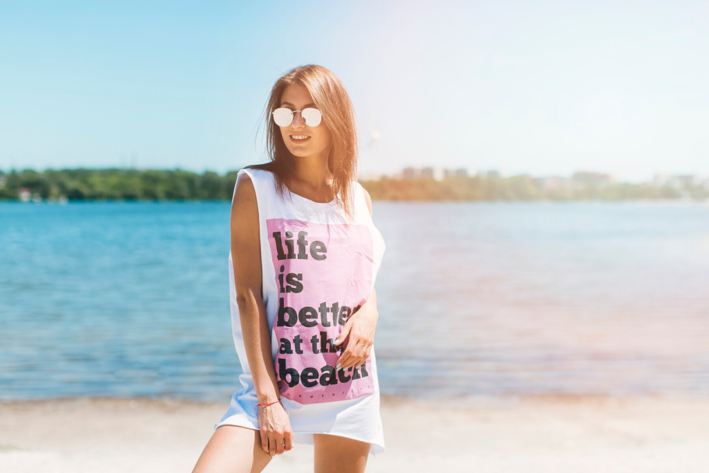 Girl on a beach wearing Summer Tee